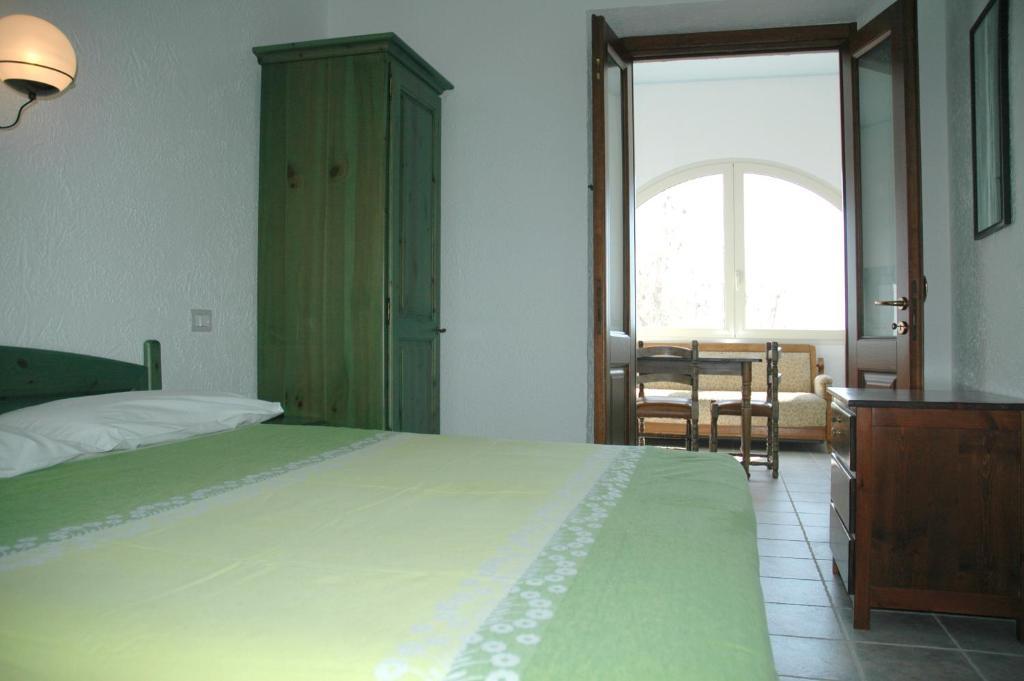 Acacia Appartamenti Cala Gonone Habitación foto